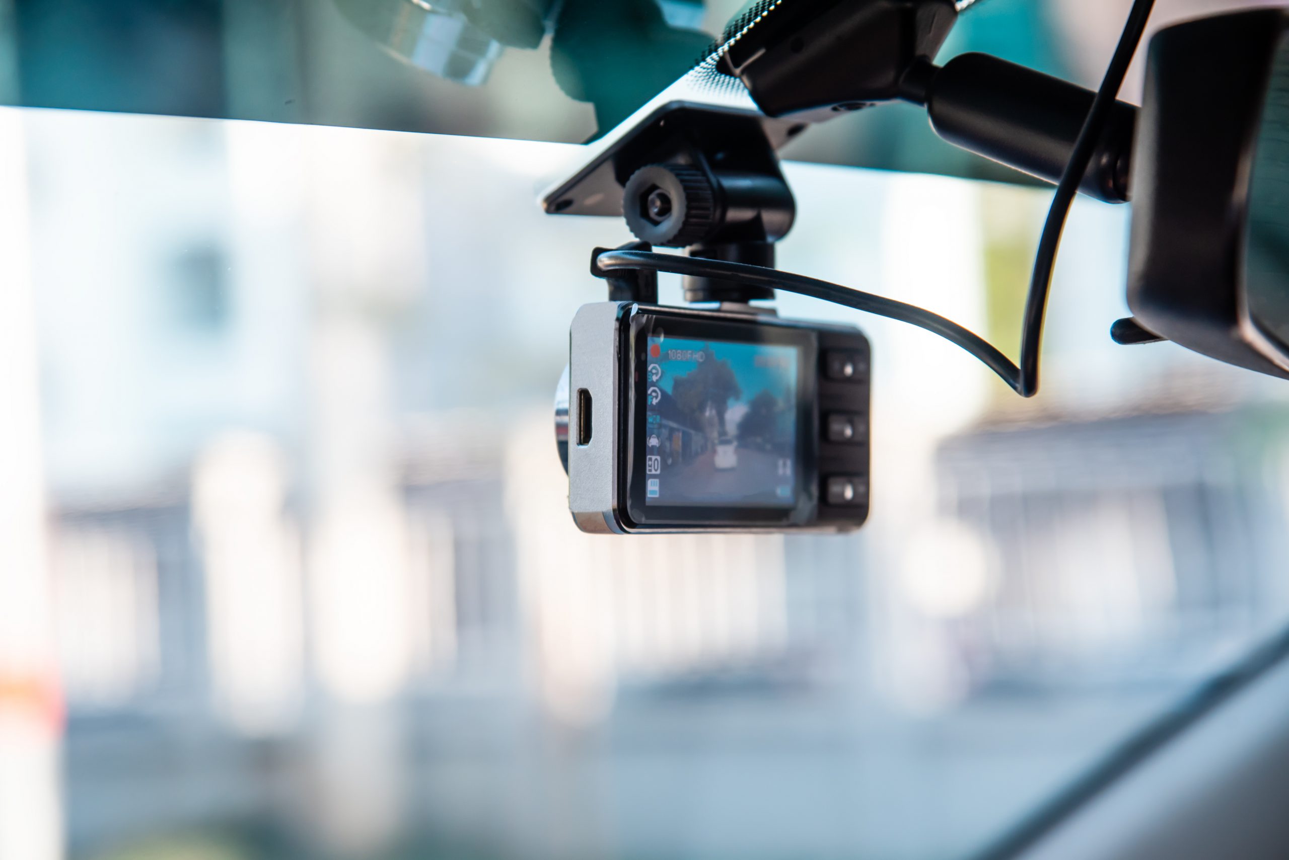 Car video camera attached to the windshield to record driving an