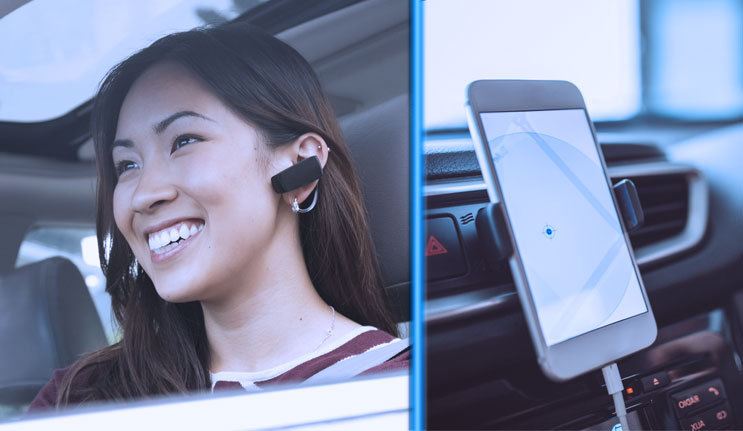 Woman Talking on Hands-Free Phone while Driving